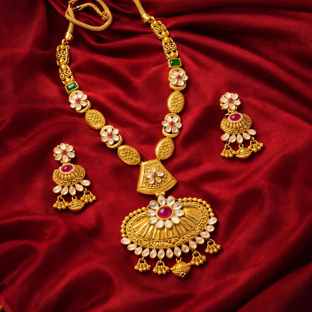 Gold Coin Lakshmi Necklace Set with Pink Stone Jhumka Earrings