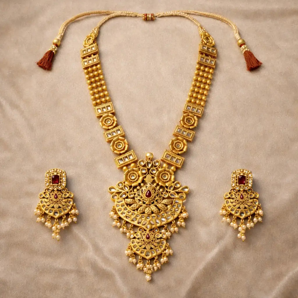 Gold Lakshmi Temple Long Haram Necklace Set with Earrings