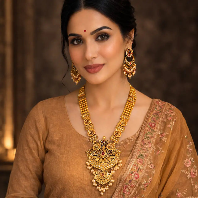 Gold Lakshmi Temple Long Haram Necklace Set with Earrings