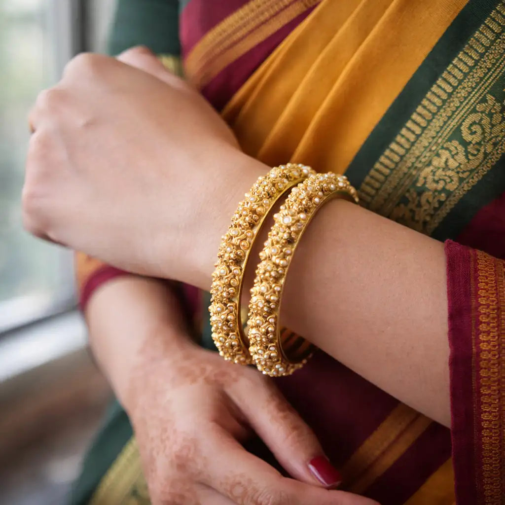 Gold Textured Ornate Bangles (Set of 2)